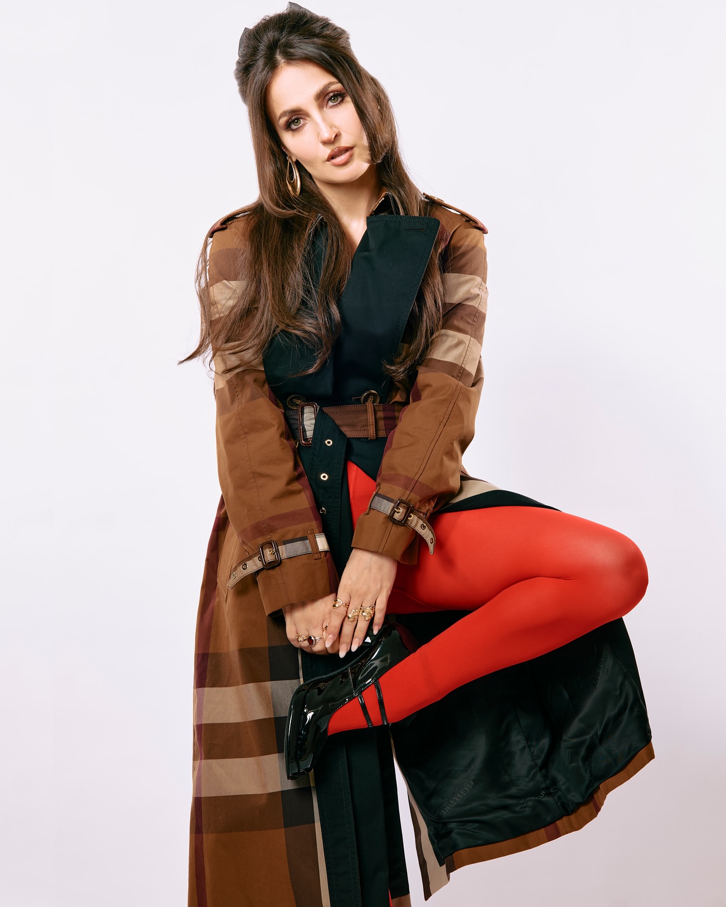 Elli Avram’s Quirky Red Riding Hood Look Steals the Spotlight Elli Avram stuns in a bold red riding hood ensemble styled by @pulsethakur & team Iconic.