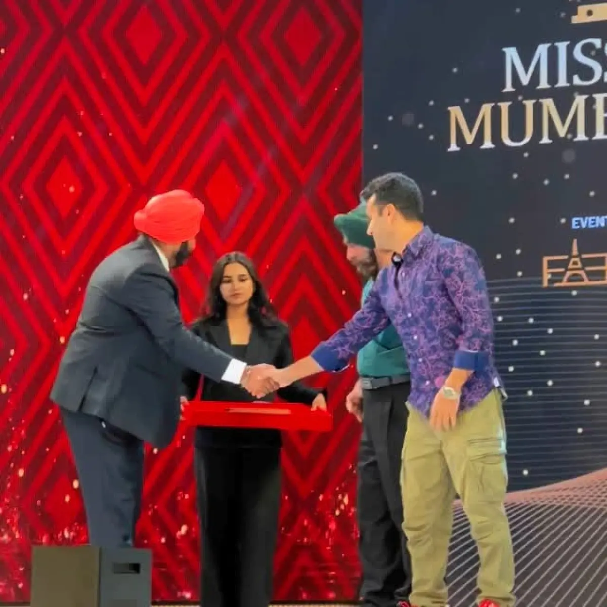 Tariq Bhat Receives Honor from Miss Navi Mumbai Today Known filmmaker expresses gratitude for recognition at Four Points Hotel hospitality ceremony