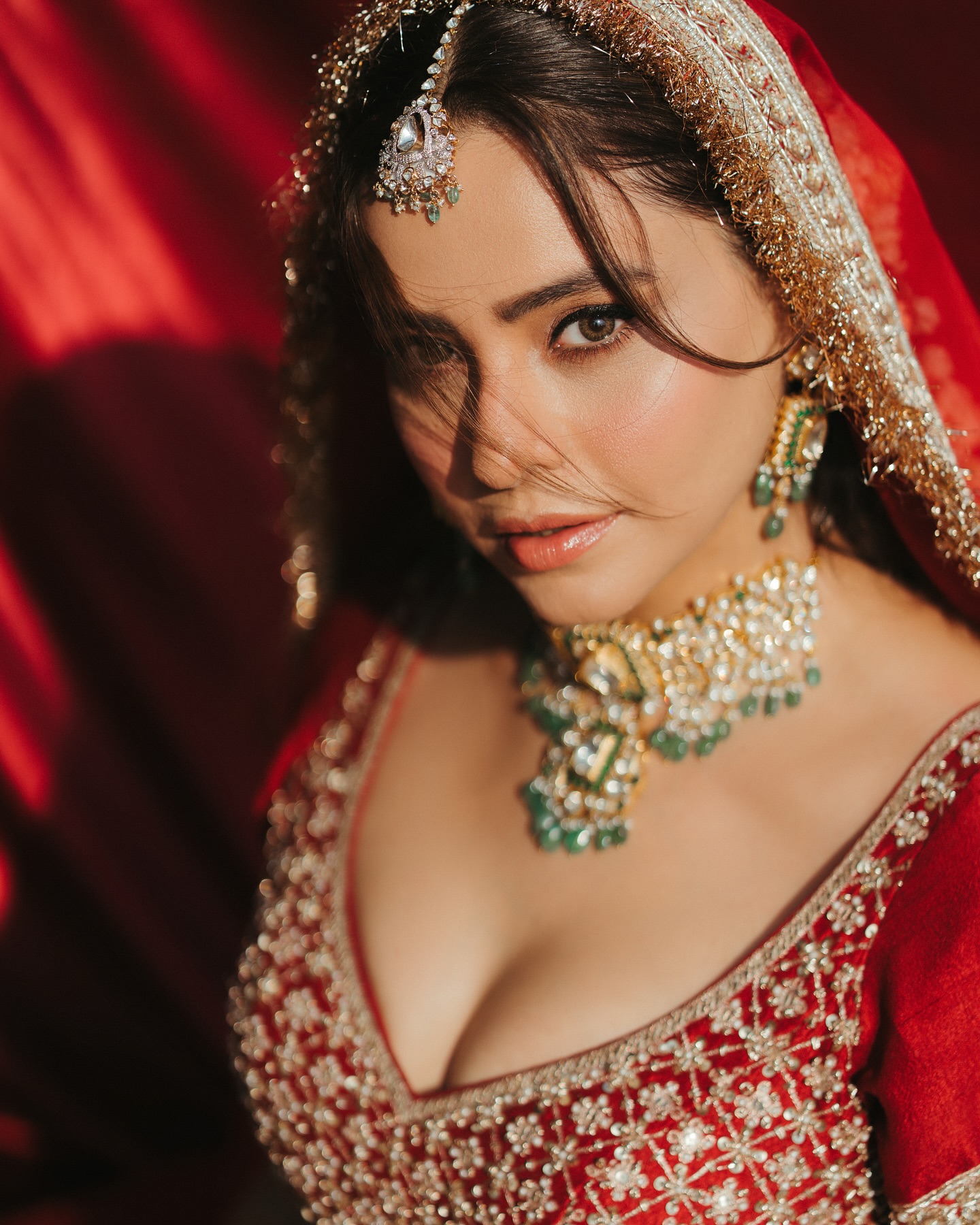 Aamna Sharif Stuns In Red Lehenga