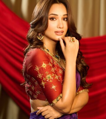 Akanksha Sharma Dazzles In Dark Purple Saree