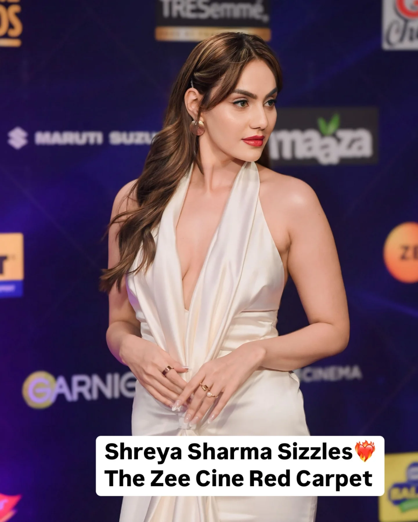 Bollywood Star Turns Heads At Zee Cine Awards Elegant and enthralling, the new Bollywood face dazzles in a timeless satin gown on stage.