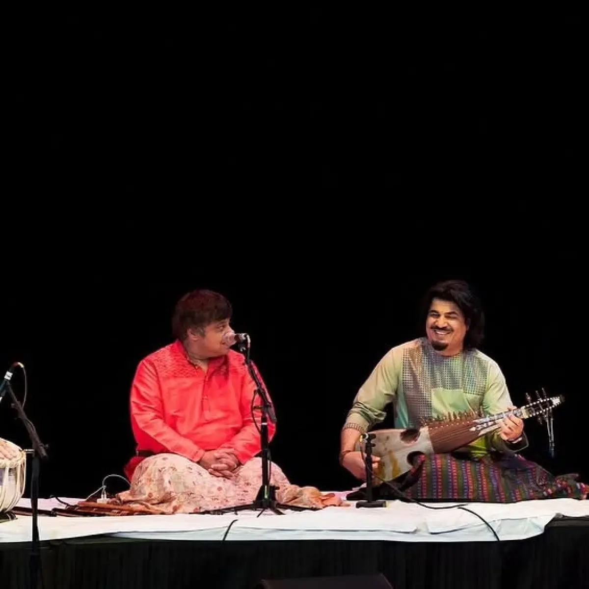 Concert Fusion: Tabla & Flute In Harmony Live concert highlights with iconic instrumentalists blending classical rhythms flawless.