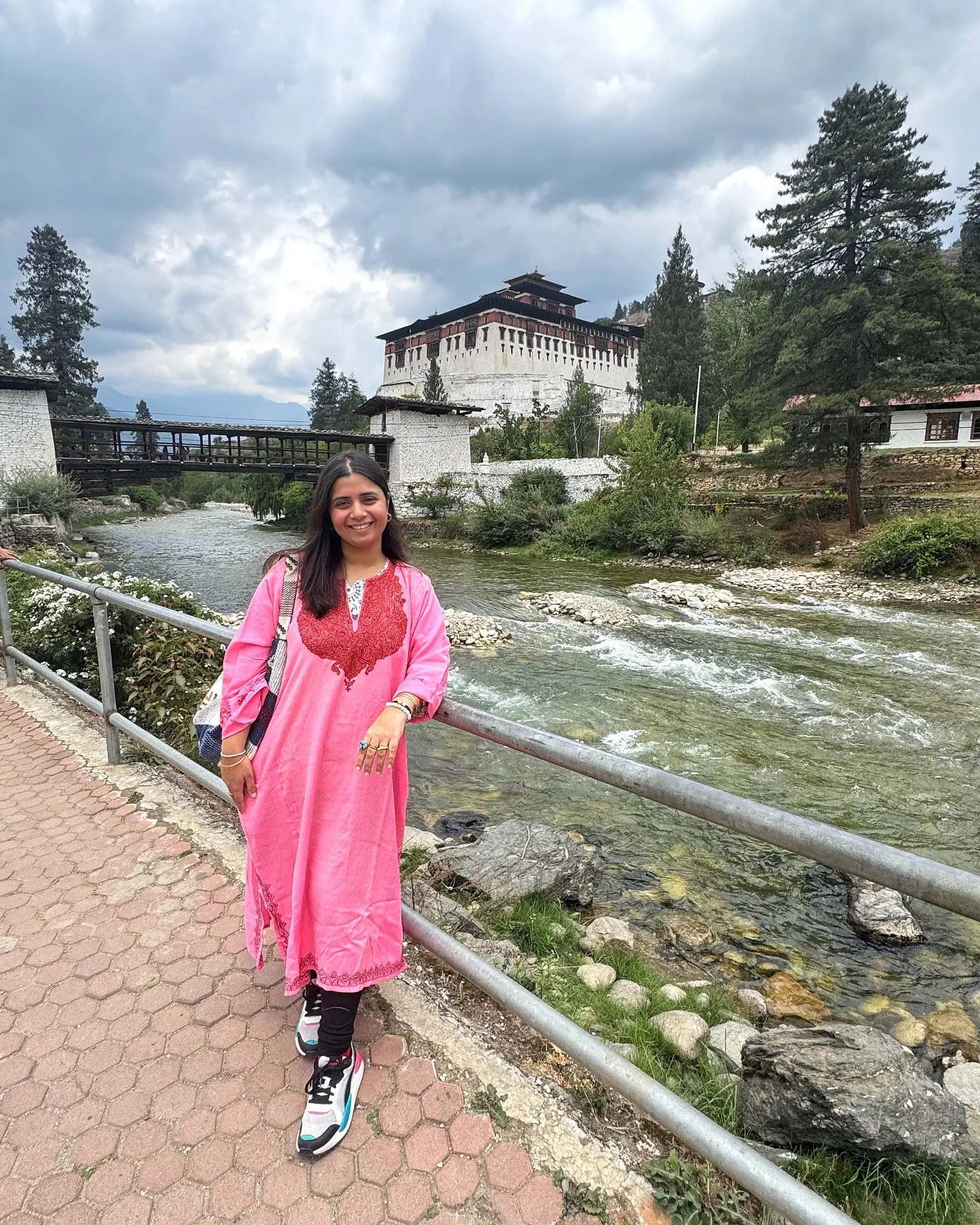 Crimson Hues Transform Paro Dzong’s Landscape Today Monks’ chants and ancient architecture create a mesmerizing Bhutan vista for travel enthusiasts.