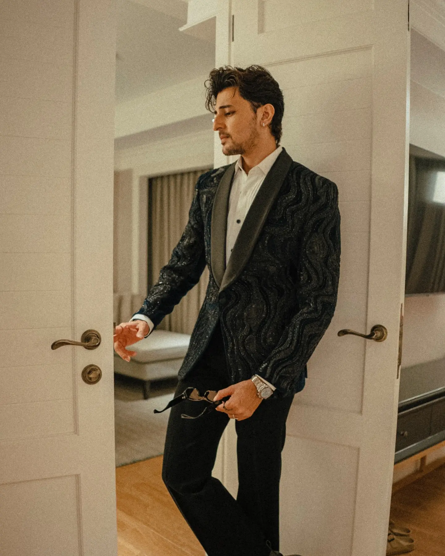Darshan Raval Teases New Music Release Singer drops curious query while followers buzz over imminent hit; clock ticks in dusk.???