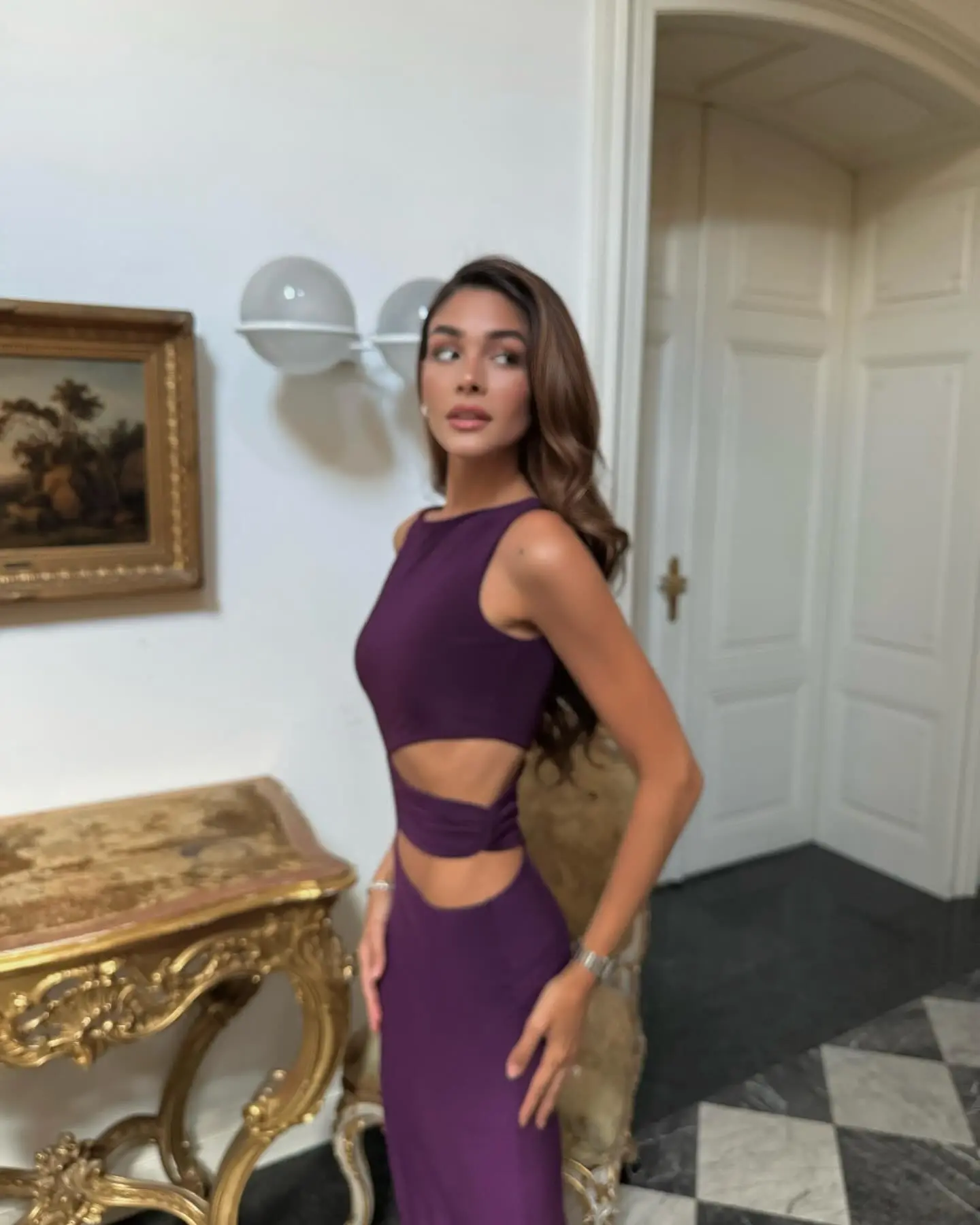Filiz Miftari Debuts Bold Purple Dress