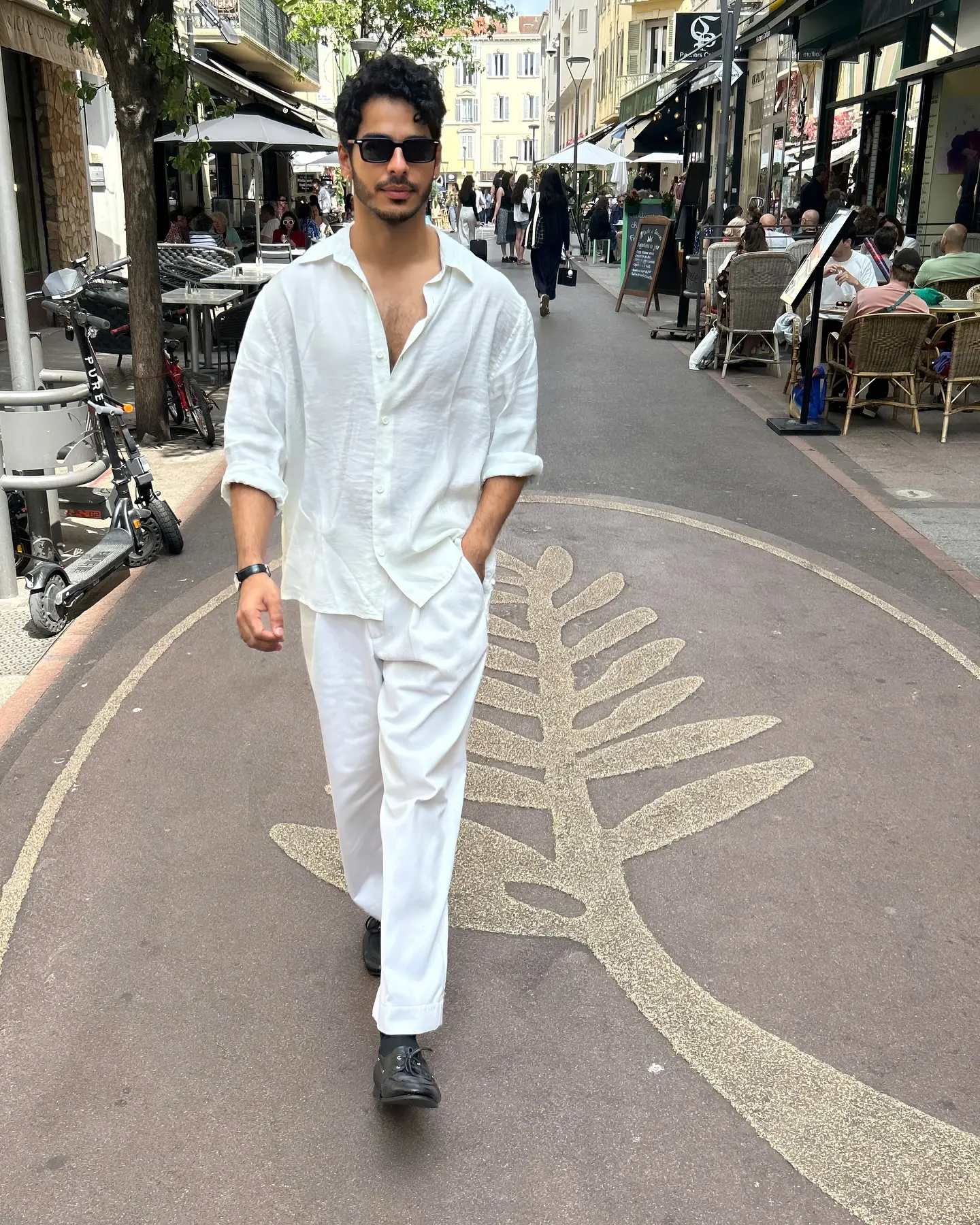 Ishaan Khatter Graces Cannes With A Warm Bonjour Celebrity Ishaan Khatter captivates Cannes with charm and style amid festival glitz on set