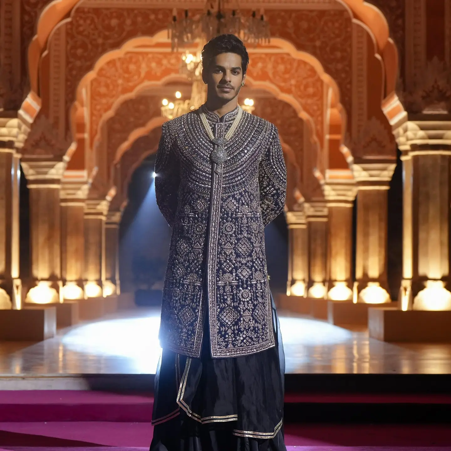 Ishaan Khatter dazzles in couture on Netflix finale, merging tradition with modern style.