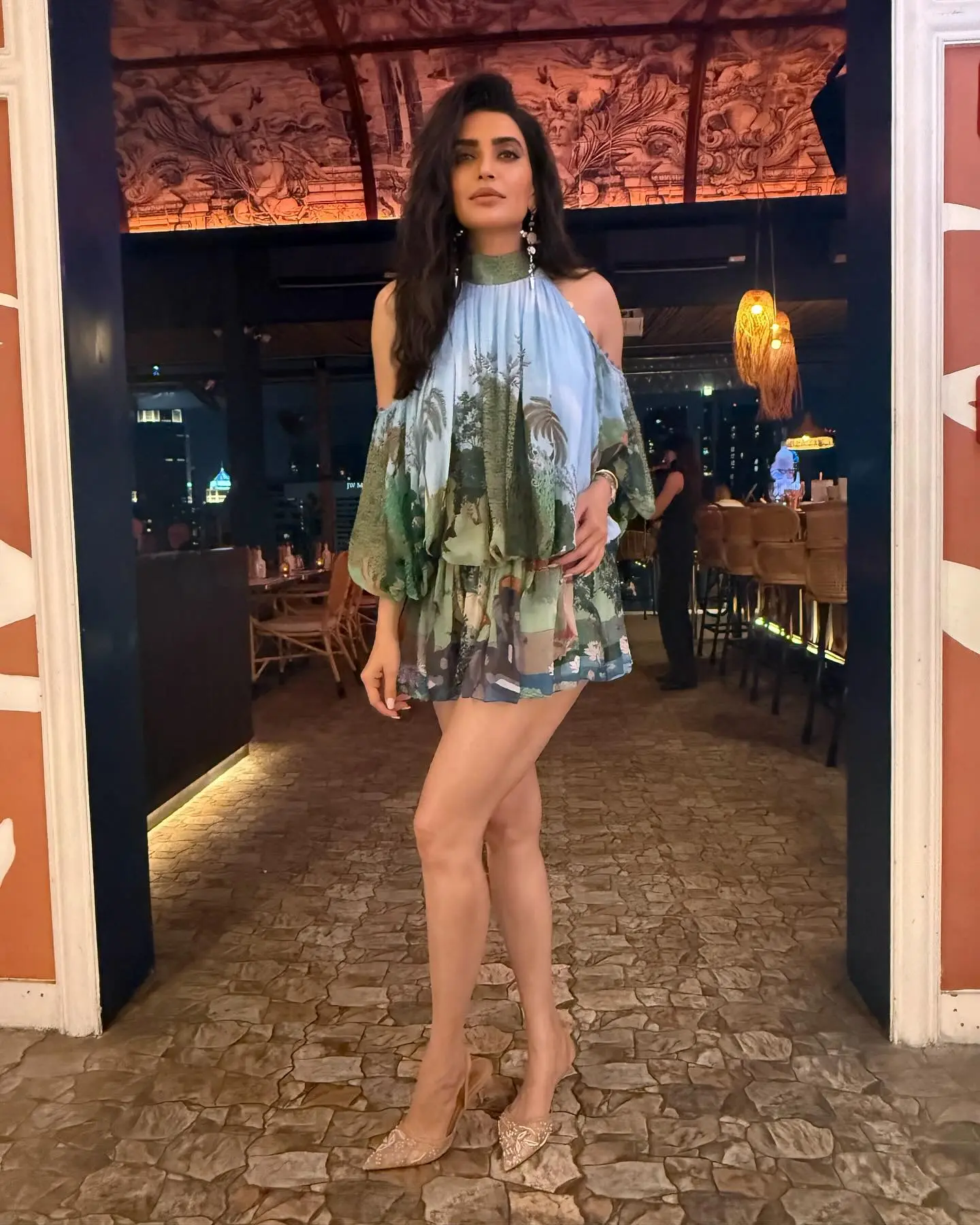 Karishma Tanna Shines In Bangkok Nights Radiant star dazzles in Thai nightlife, flaunting luxe look and exquisite ear jewels right.