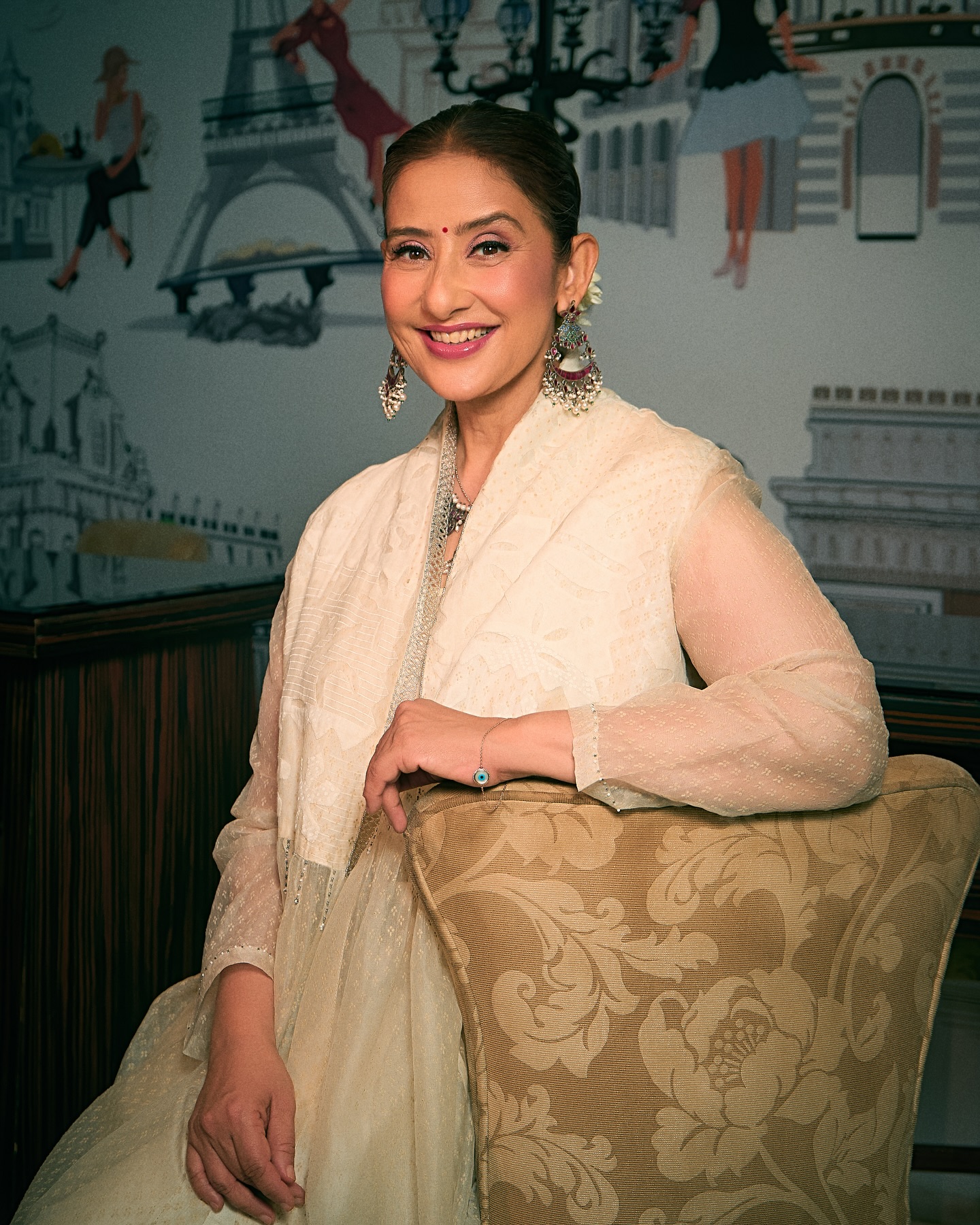 Manisha Koirala Radiates Elegance On Social Media Manisha Koirala dazzles in chic fashion collaboration, lighting up the scene with her smile.