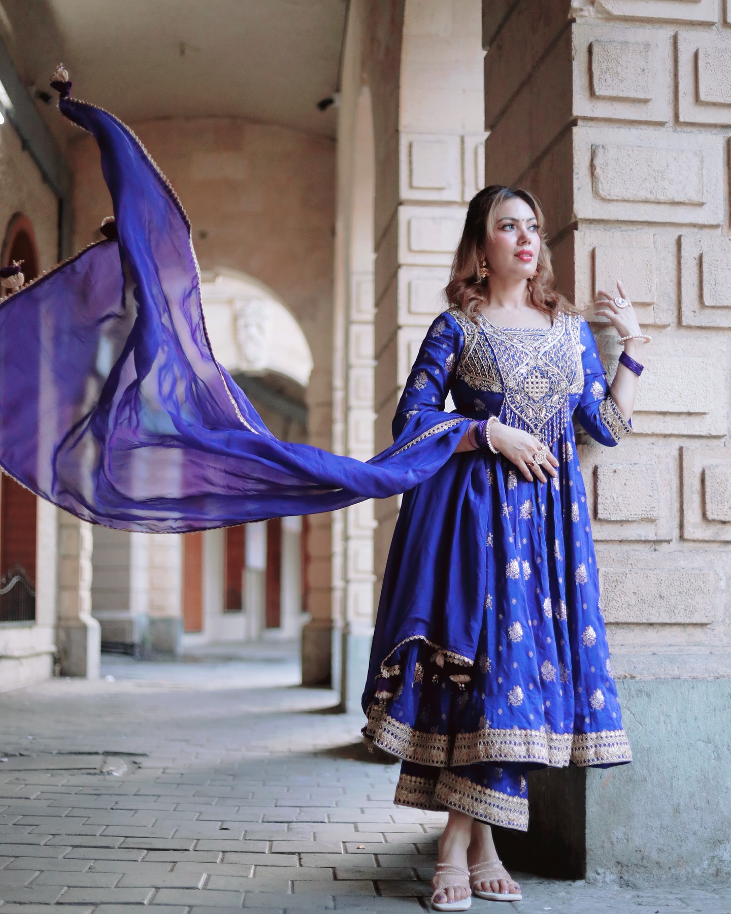 Munmun Dutta Stuns In Chic Photoshoot A bold display of chic aesthetics blending traditional charm with modern elegance on set.