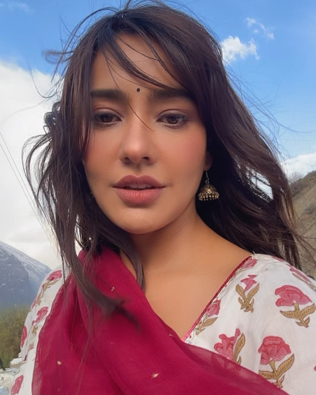 Neha Sharma’s Winter Escapade In The Mountains Neha Sharma captures wintry vibes in mountains: Maggie vs chai in a high-altitude style.!!