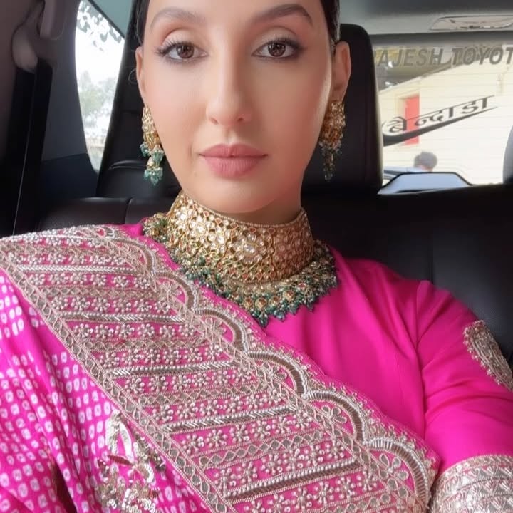 Nora Fatehi Transforms Into Ayesha Dhondi In Pink Saree