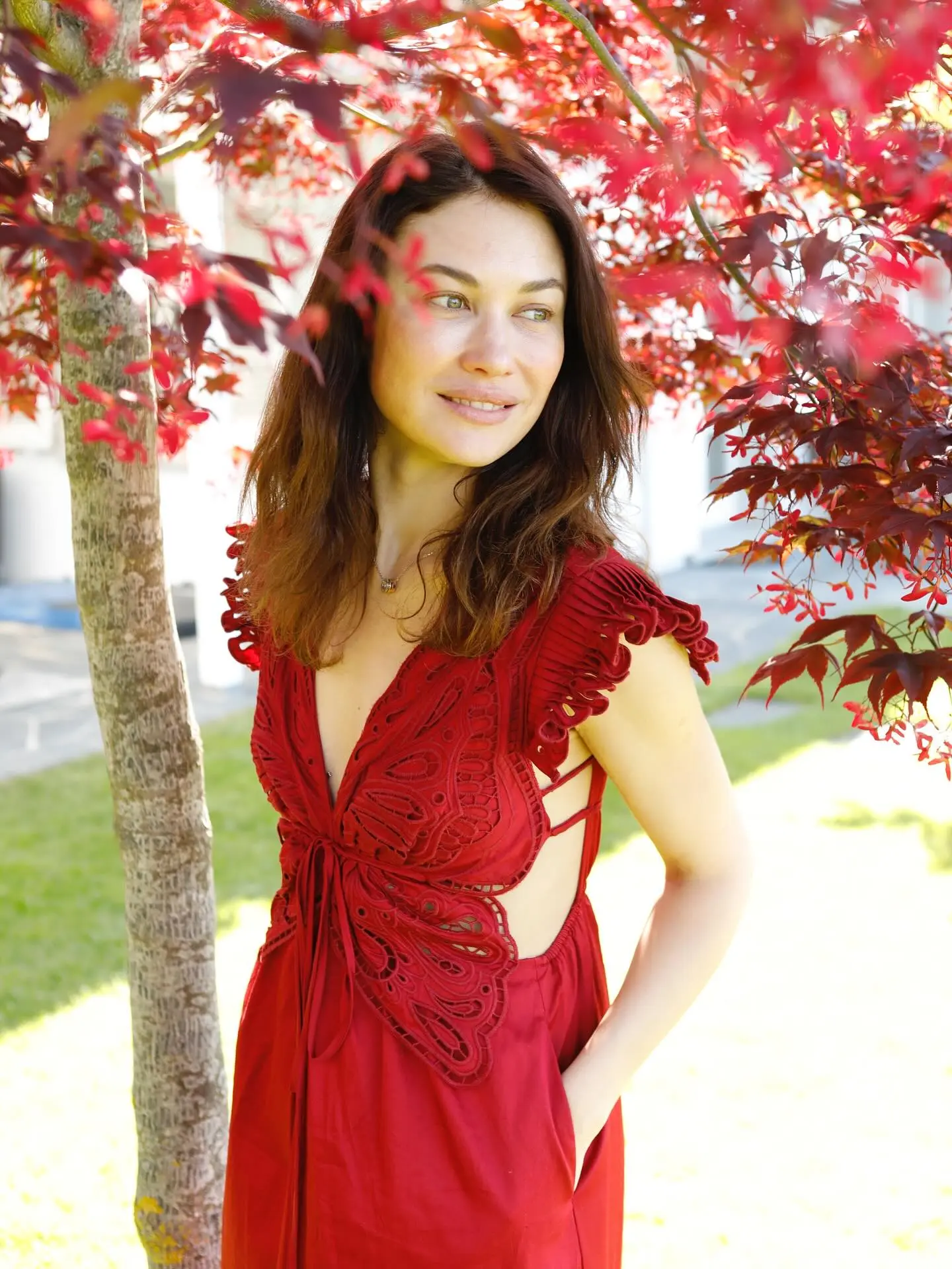 Olga Kurylenko Reflects In Signature Style In a calm, vivid snapshot, the renowned actress exudes understated grace and vibrant style.