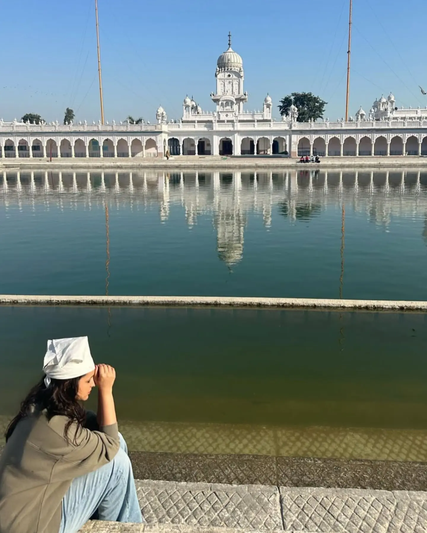 Parineeti Chopra Seeks Spiritual Blessings Bollywood star Parineeti embraces a reflective moment, sharing tranquility and blessings!!