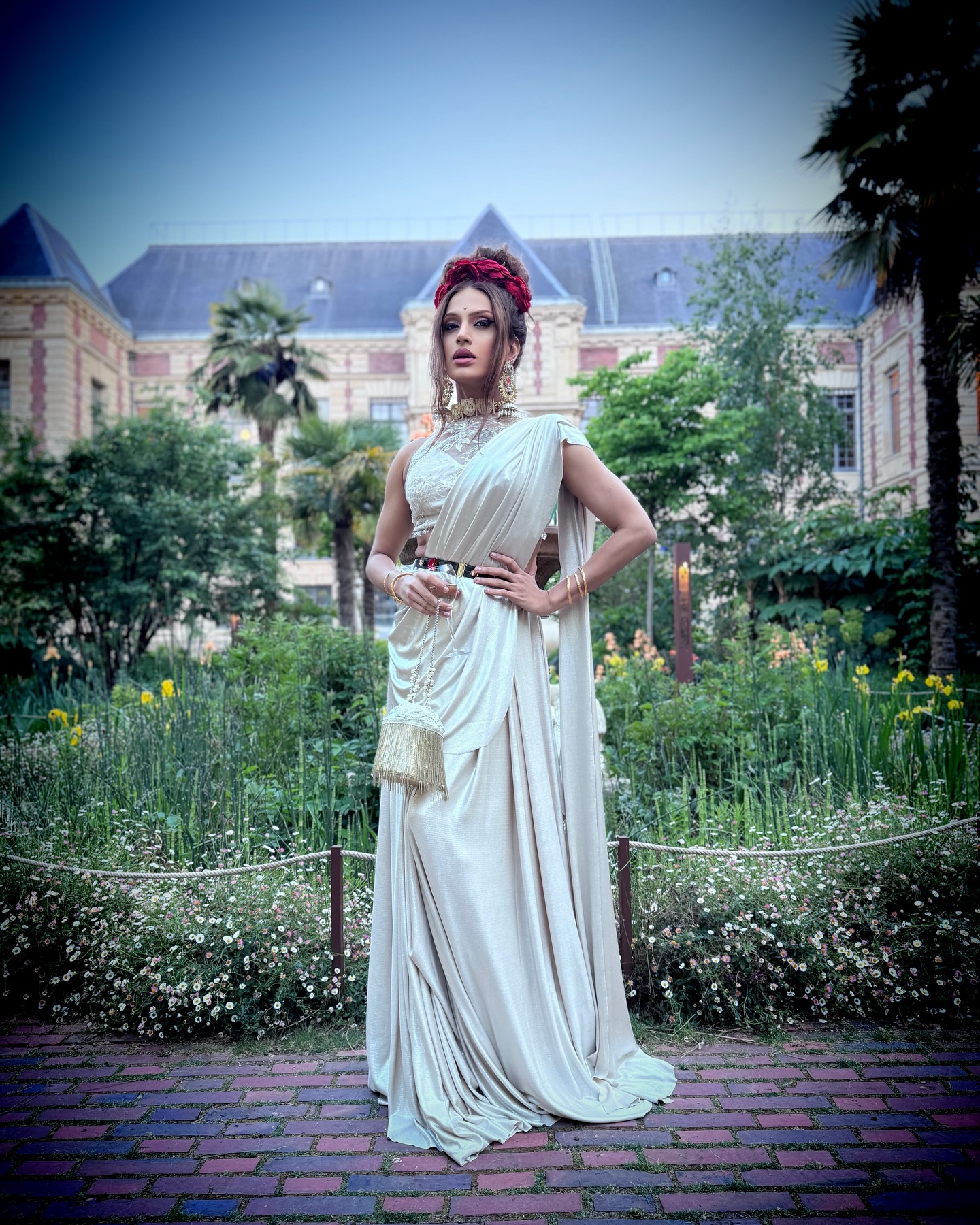 Indian drag royalty lights up Paris with elegant saree and a bold, creative serve of style.