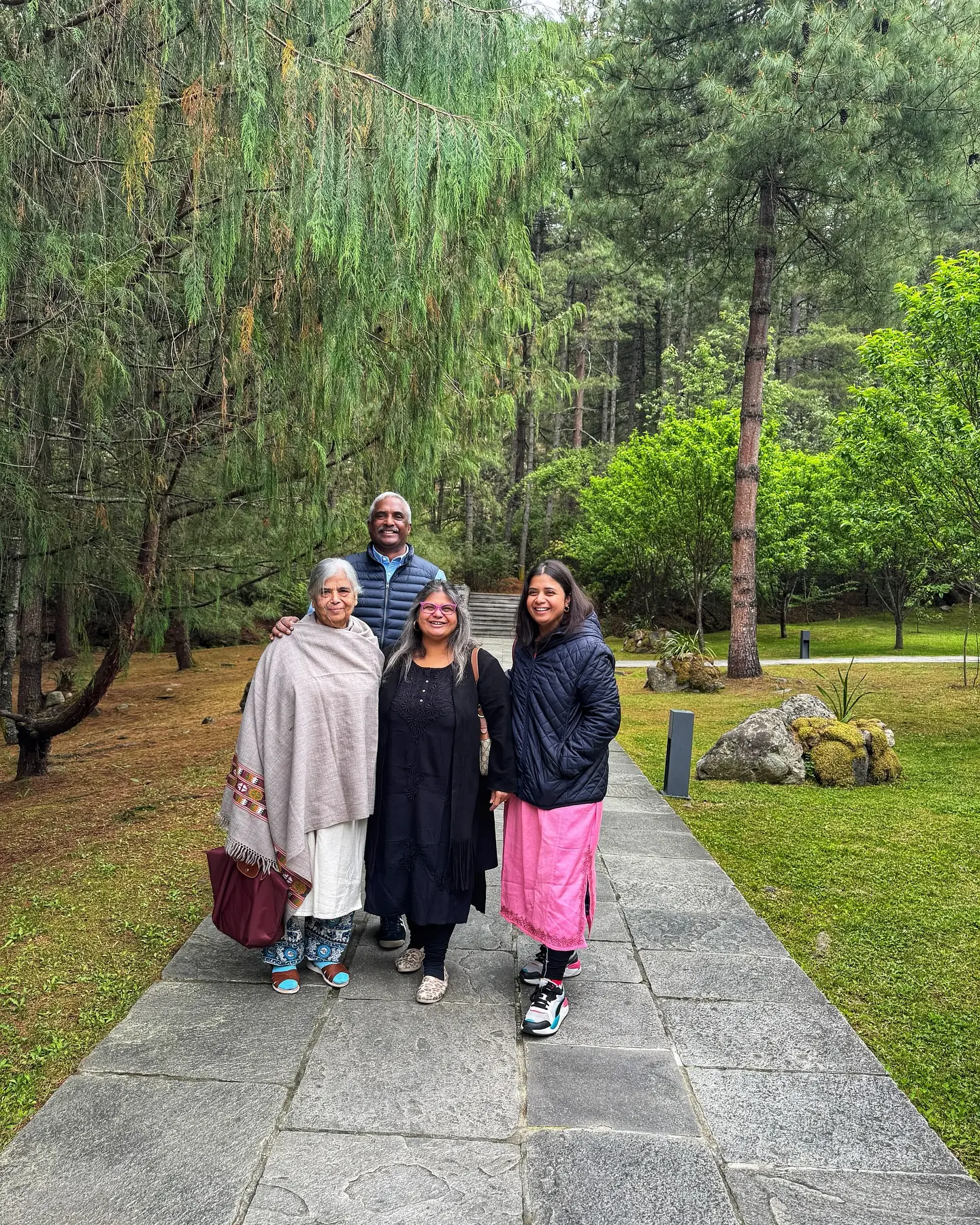 Rupali Dean’s Bhutan Escape: Mountain Breeze and Tall Trees Rupali Dean revels in Bhutan wilderness, embracing a serene escape with pure mountain air.