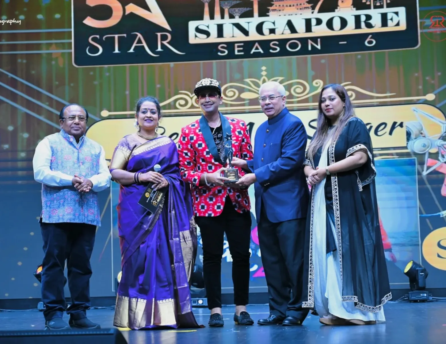 Satyajeet Pradhan Wins Best Playback Singer Award Celebrating his triumph in Singapore with gratitude, joy, and a memorable night of cinematic honors.