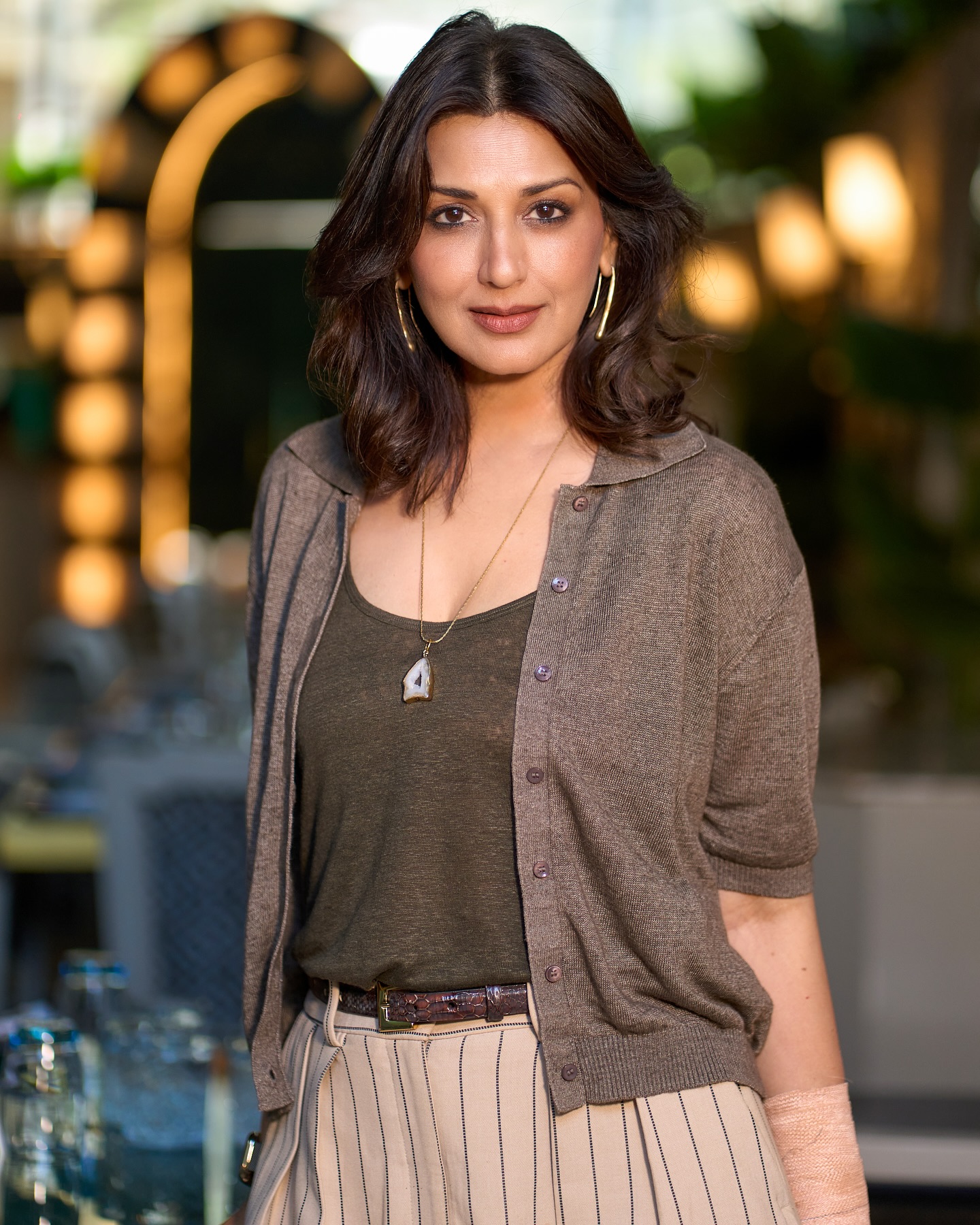 Sonali Bendre Steps Into Day With Coffee Vibes Celebrity icon emulates coffee to kickstart her day, radiating charm and relaxed energy.