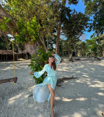 Actor Krittika shines in a beachside look styled for tropical adventure in sunny paradise.