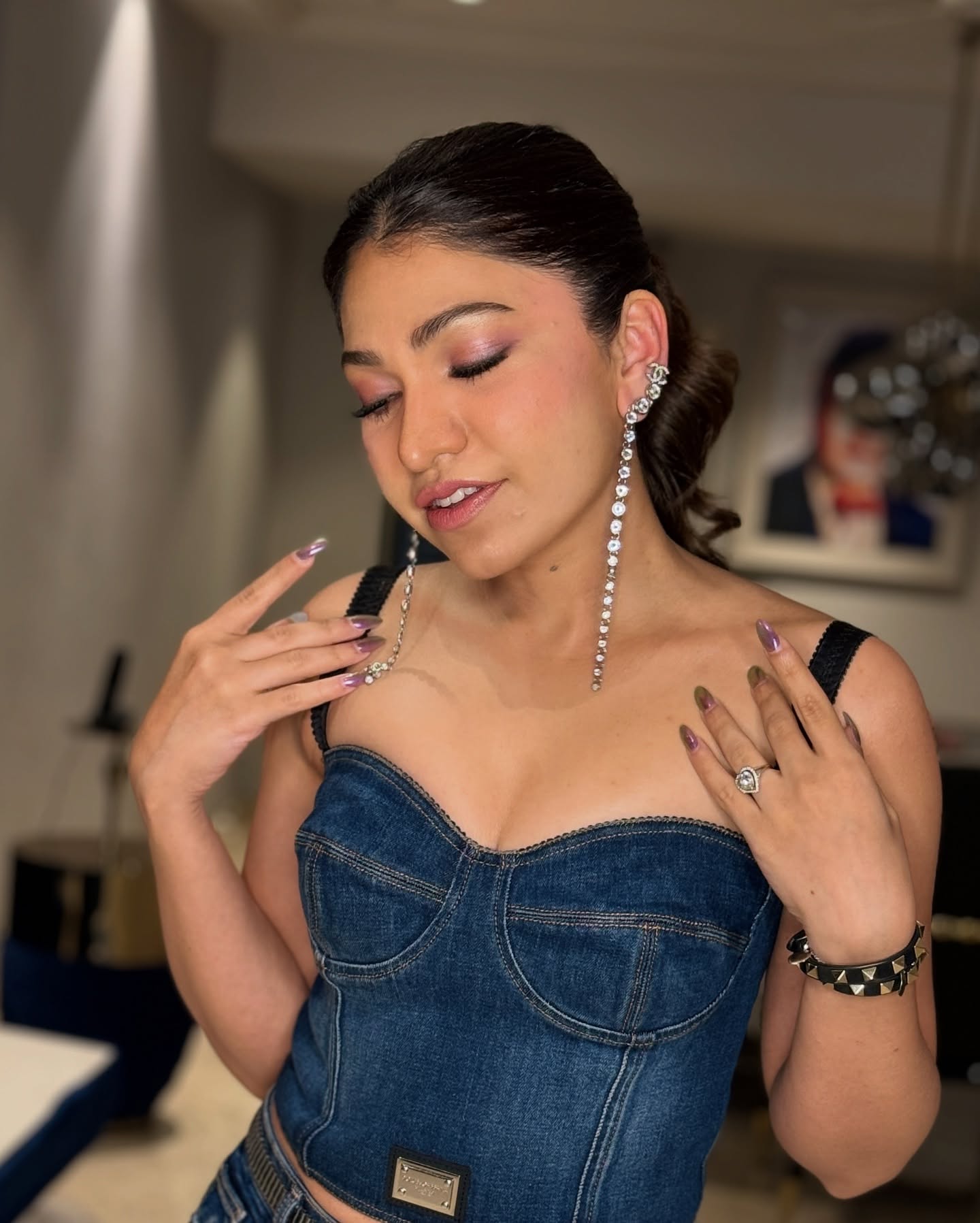 Tulsi Kumar Flaunts Bold Denim and Chic Accessories Celebrity style meets casual chic: bold denim, statement earrings, corset top, and more.!!