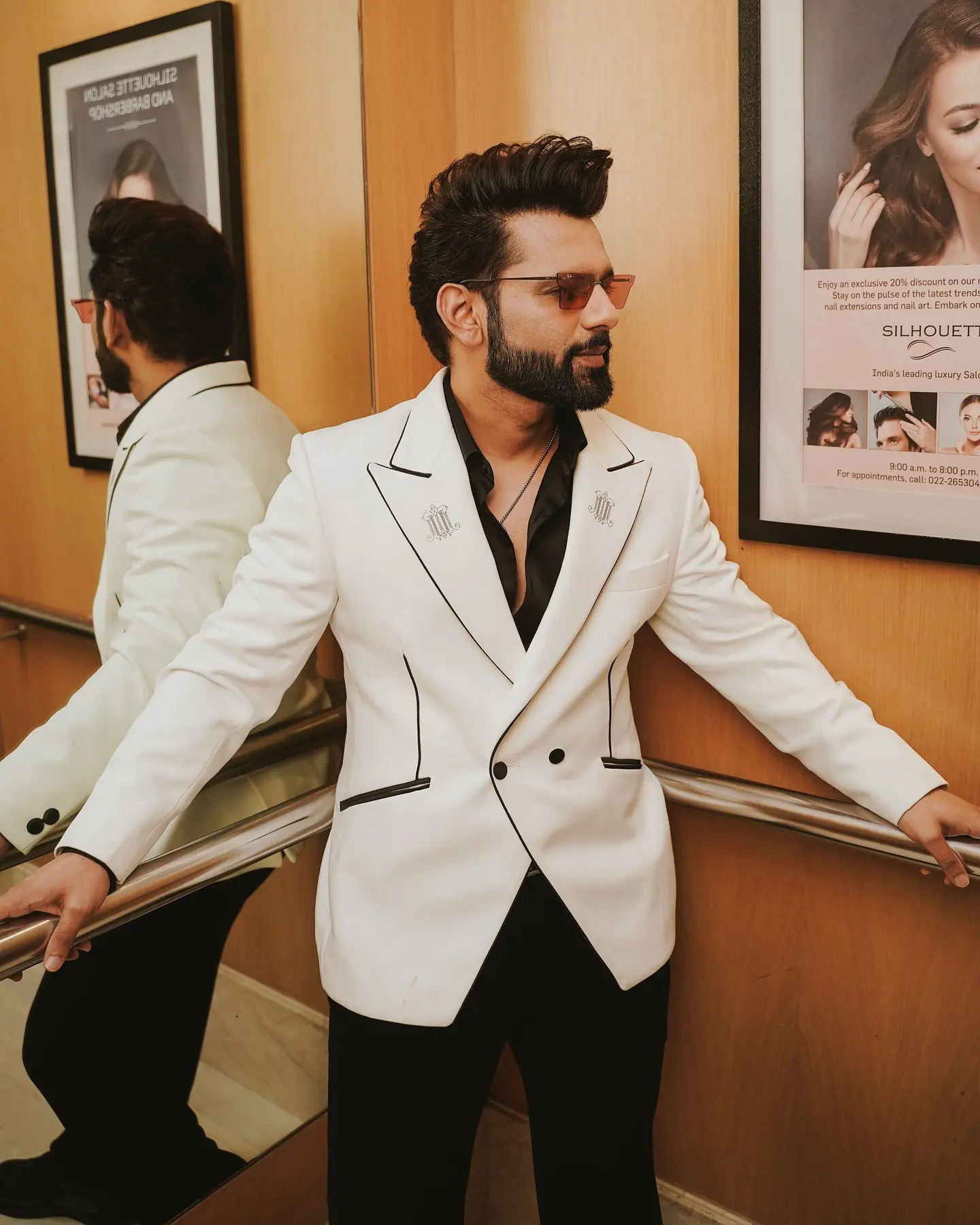 Rahul Vaidya Strikes A Classic Pose The singer stuns in white, merging iconic aesthetics with cool vibe.