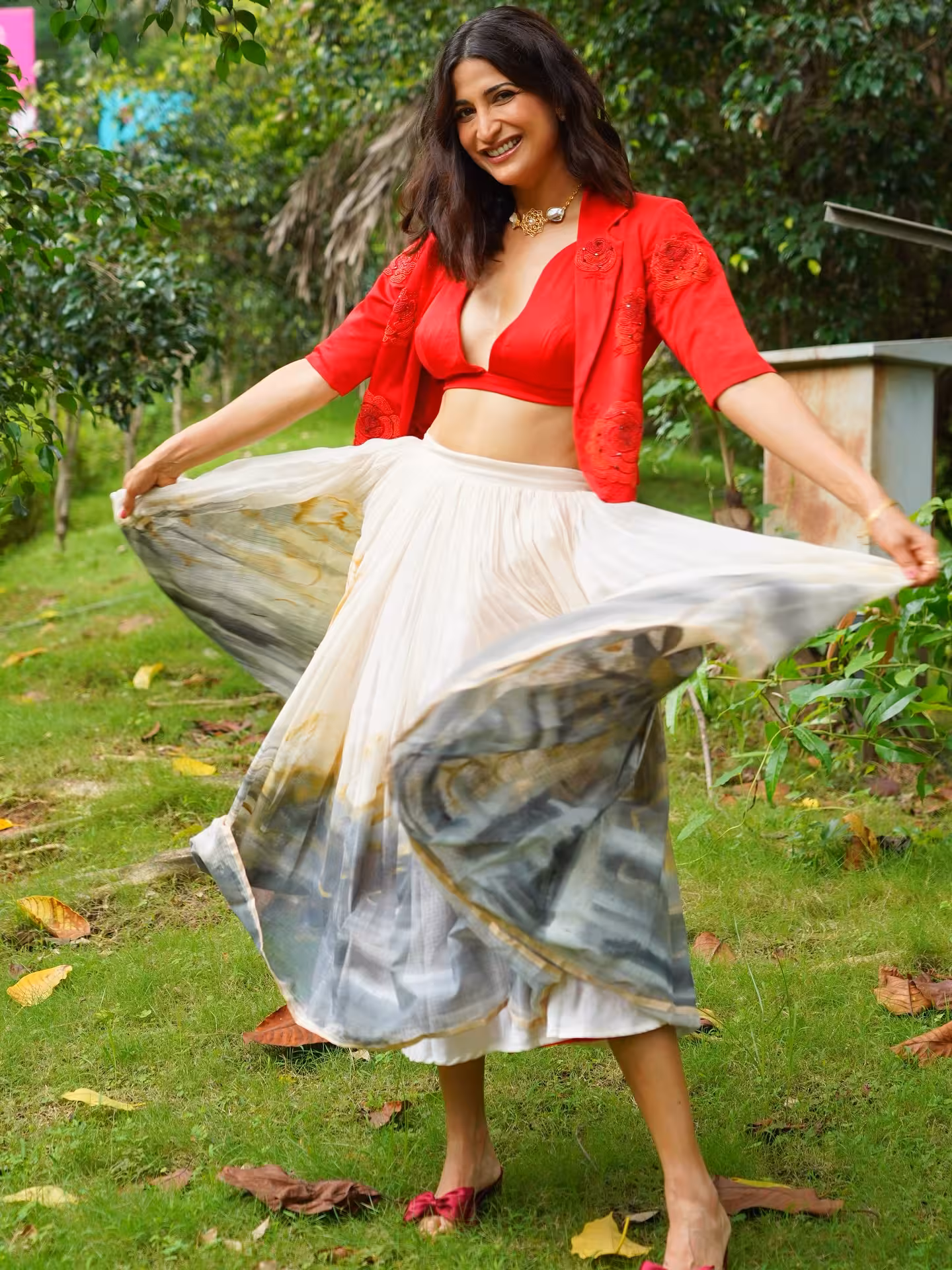 Aahana Kumra dazzles in a chic shoot, twirling with trendsetting style and grace - magic!