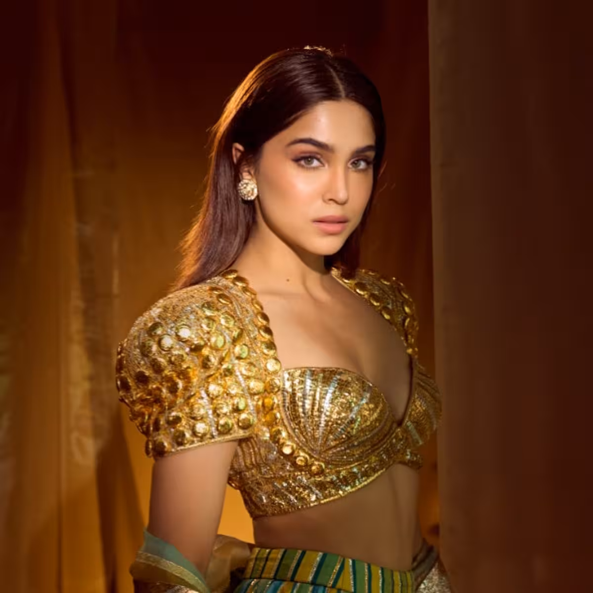 Traditional meets modern in this striking look that redefines glamour with bold detail!!!