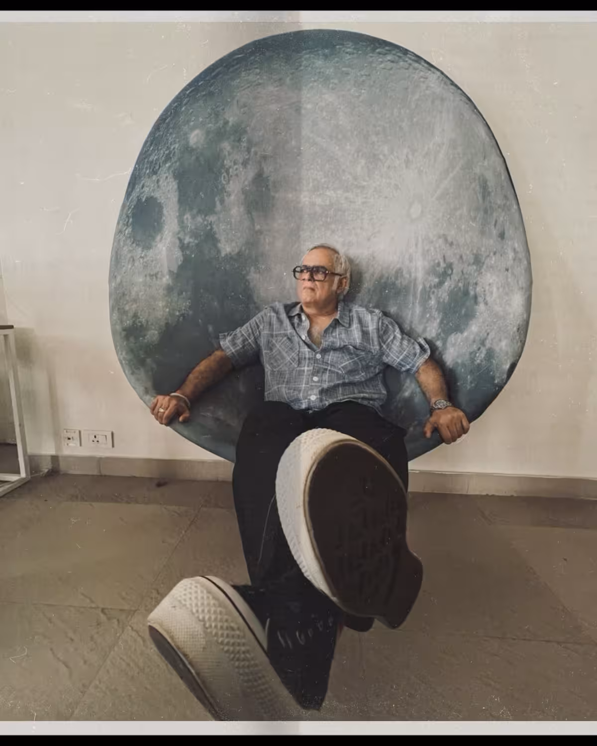 Renowned director Hansal Mehta stuns in a Wear London shirt and Converse shoes, all unpaid.