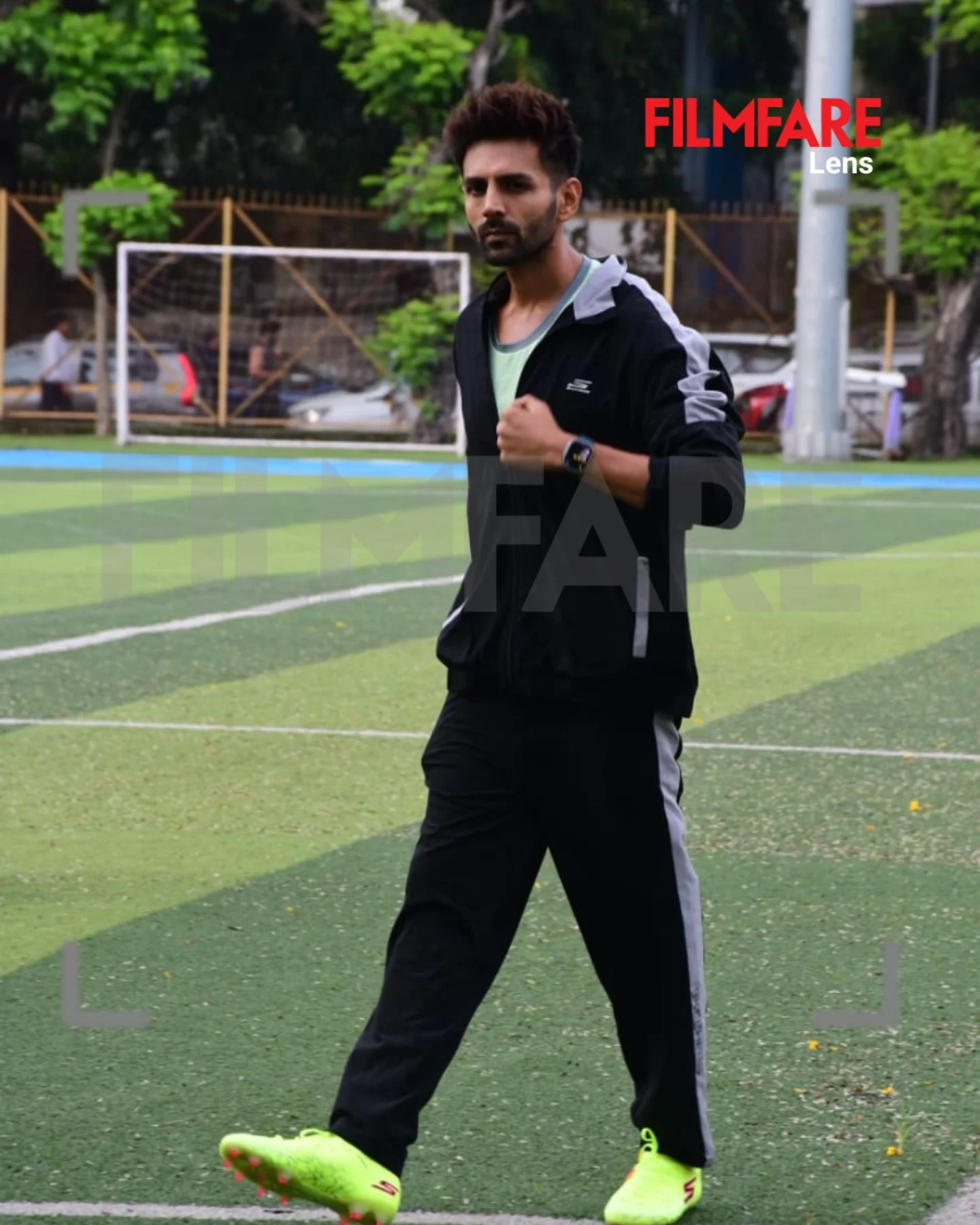 Filmfare lens captures Kartik Aaryan enjoying a casual football moment, mixing charm & sport.