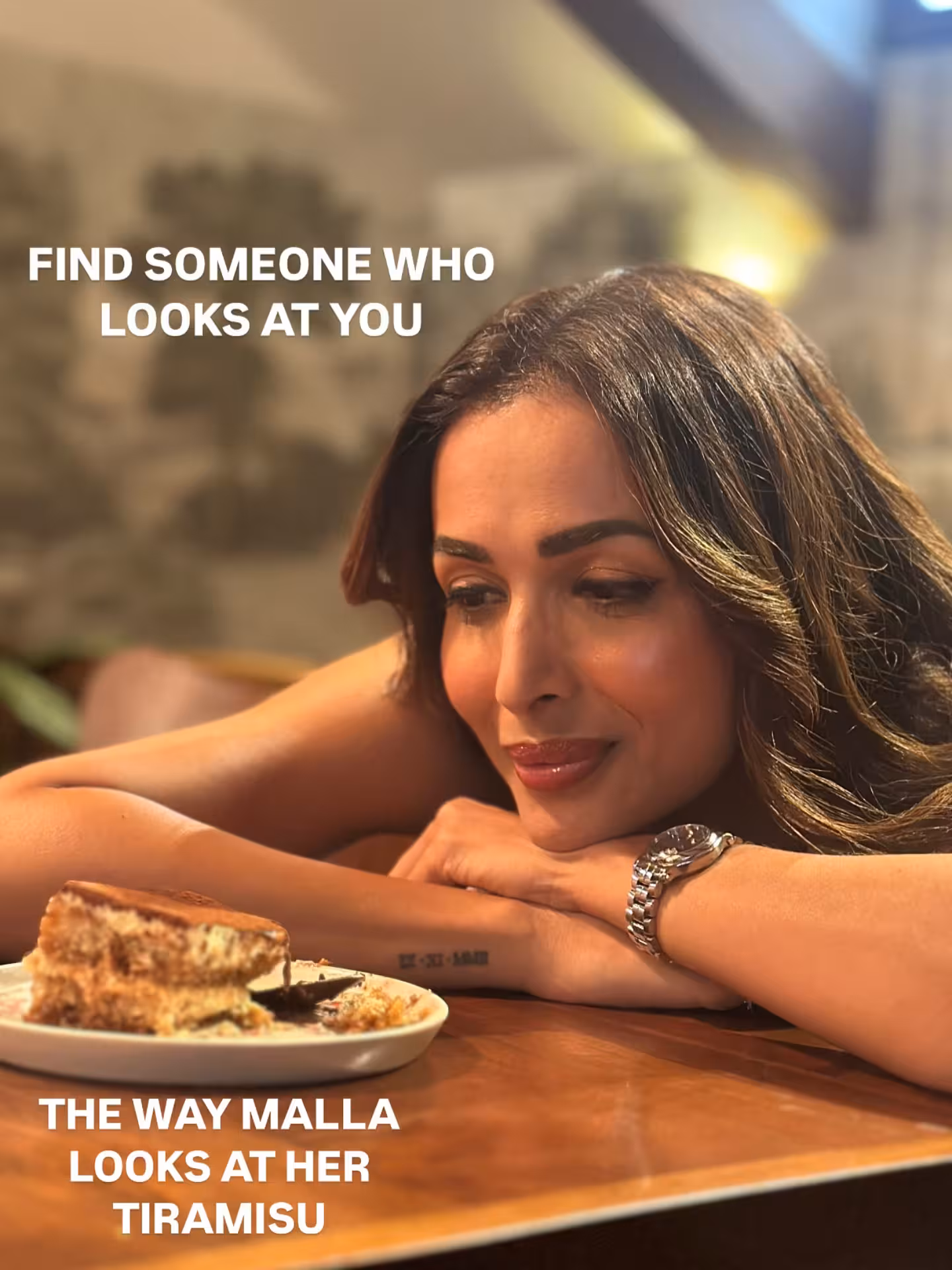Stylish indulgence as Malaika savors Scarlet House Bombay’s famous tiramisu delight right!