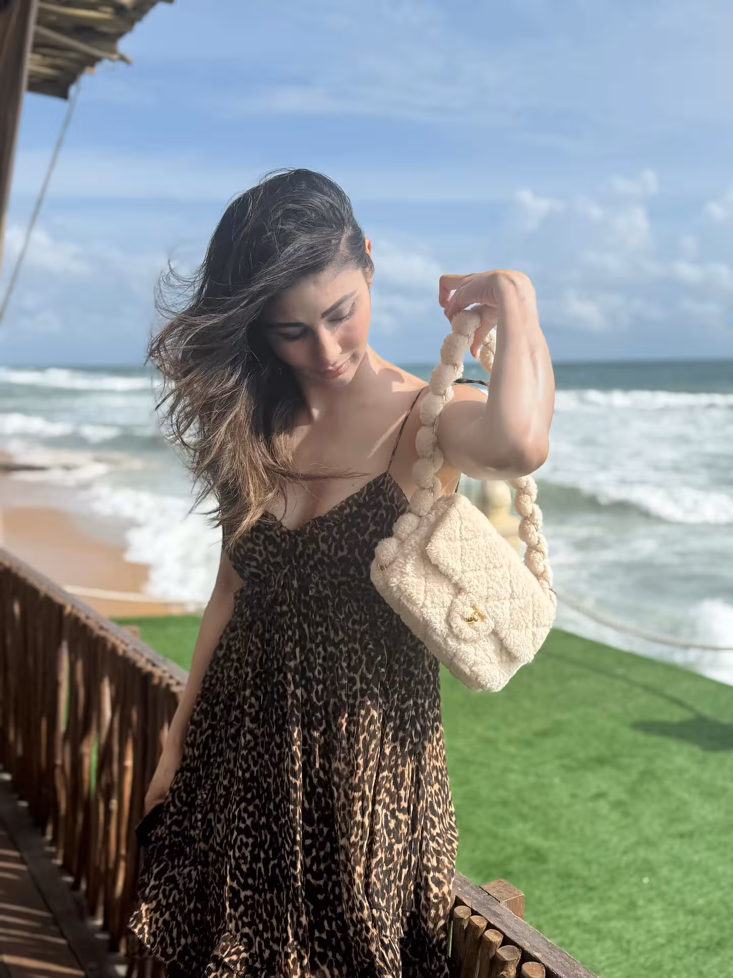 Mouni Roy Embraces Wind-Swept Kiri Bath Ritual