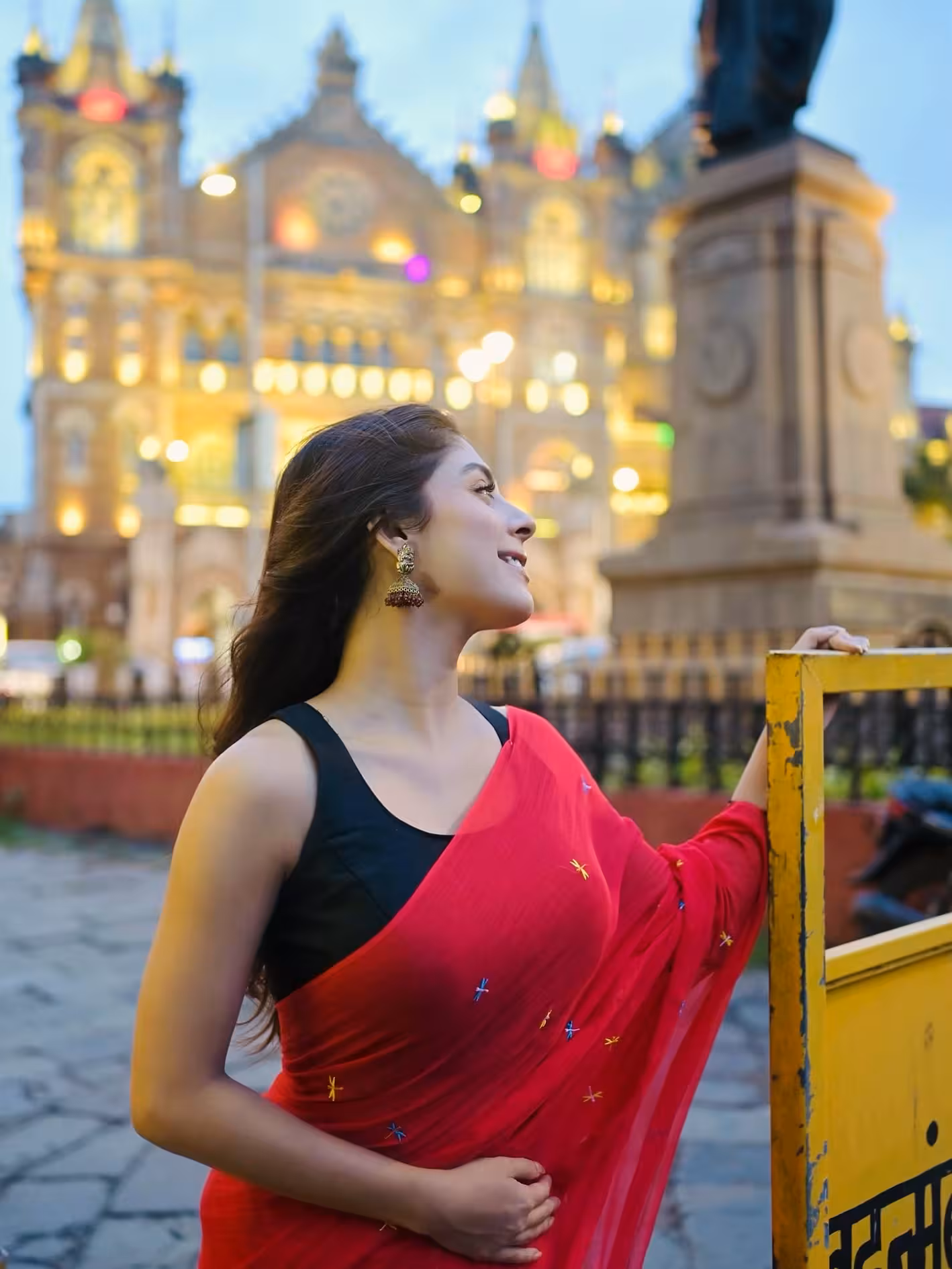 Elegant urban charm meets rain-kissed allure, revealing refined romance beyond cityscapes!