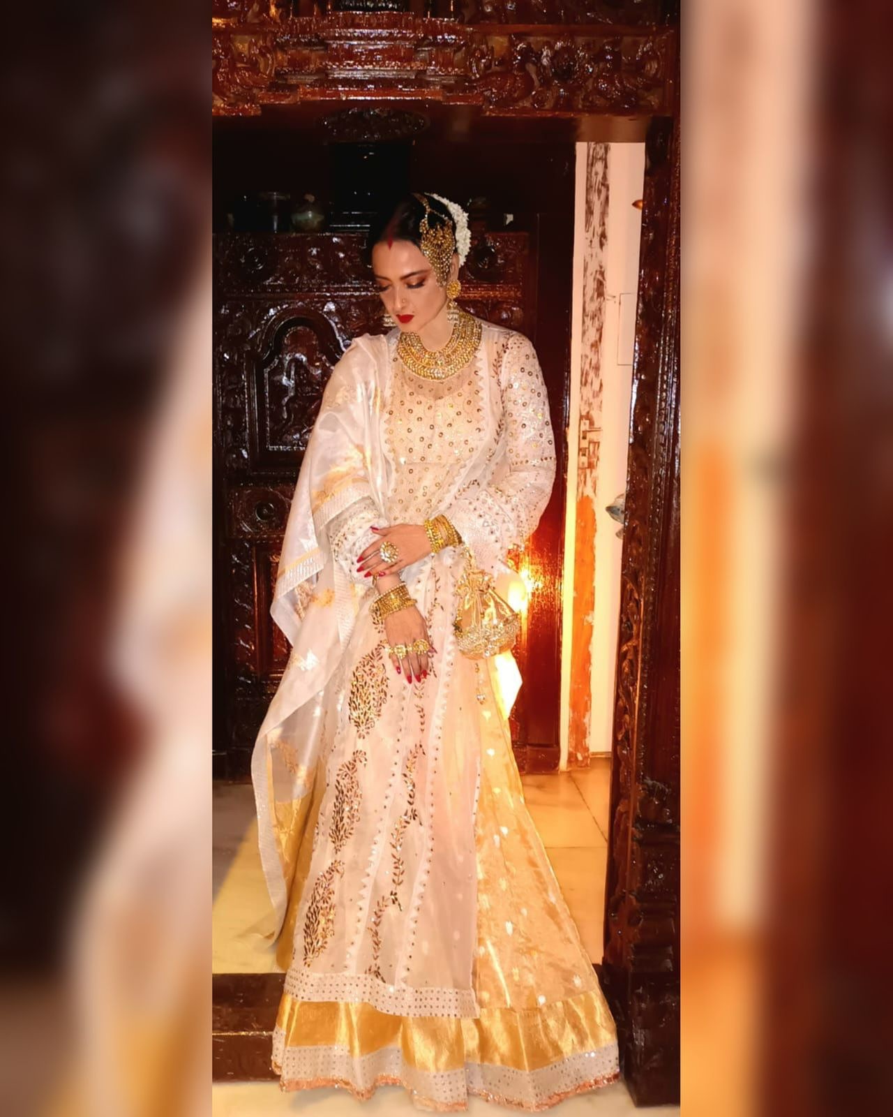 Rekha Radiates in Custom Gold Ensemble