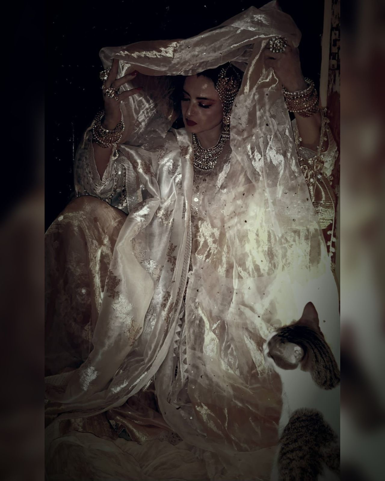 Rekha Radiates in Custom Gold Ensemble